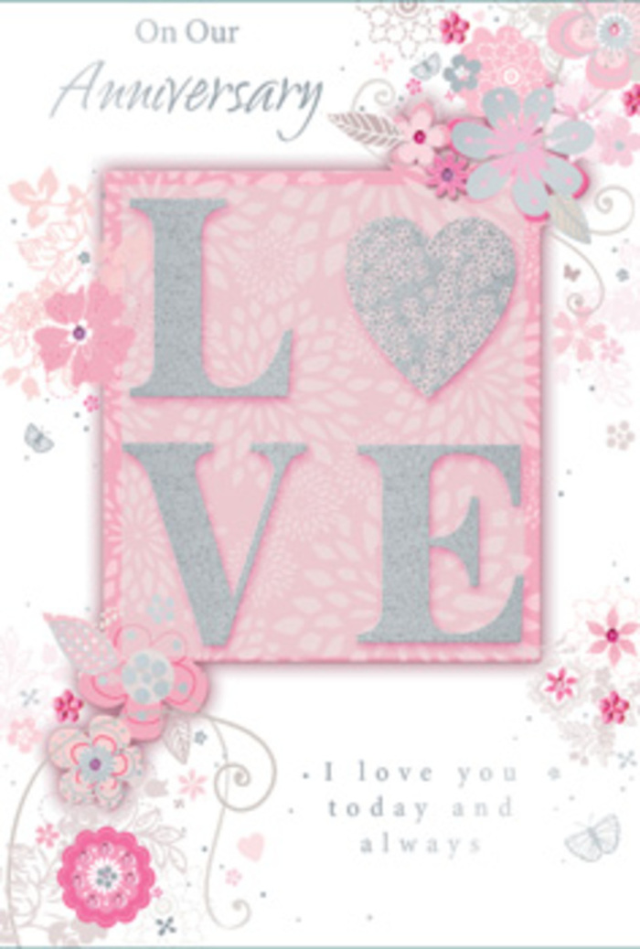 The anniversary card in this image feels like a hand-crafted tribute to lasting love, designed with the same care a florist in Ilford might use when selecting each stem for a bespoke bouquet. At its heart, the word LOVE appears in large, raised letters, dusted with sparkling yet refined glitter that looks almost frosted, like the first light striking petals on a cool morning in Valentines Park. The letters are slightly embossed, providing a satisfying texture that encourages a gentle touch, making the card as tactile as it is visually expressive. They rest on a soft blush-pink panel, framed by a halo of pearly white and very pale grey, creating a calm focal point that draws the eye. Flowing out from behind this central word are delicate sprays of illustrated flowers and foliage, their petals and leaves rendered in slender lines, pale pink shading, and touches of silver that suggest subtle foil detailing. The blossoms appear to drift across the card's surface, reminiscent of petals carried by a breeze along Ilford High Road after a spring rainfall. Fine scrolls and filigree-like curves connect each floral element, giving the impression of a carefully woven garland or an intricate wedding bouquet. Alongside this, a graceful message in elegant script-simple, heartfelt anniversary wishes-sits harmoniously within the design, never overpowering the floral artwork. The overall palette of blush, ivory, powder pink, and silver-grey creates a serene, romantic mood, perfect for commemorating shared years together. It is easy to imagine this card being chosen alongside a pastel arrangement from Florist Ilford, both pieces working together to convey tenderness, appreciation, and enduring commitment.