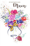 This Mother's Day card features an exuberant floral illustration, painted in free-flowing watercolours that seem to dance across the page like a spring breeze moving through an Ilford garden. At the heart of the design, lush petals in rich cerise, fuchsia, and raspberry pink mingle with softer notes of lavender, cornflower blue, and warm peach, each bloom loosely defined with sweeping strokes of deep indigo. Subtle veins and outlines picked out in golden ink add a luxurious glimmer, catching the eye the way the evening sun catches new leaves in Valentines Park. The bouquet rises from a curving vase, softly shaded in complementing tones and tied with an elegant golden bow that recalls freshly trimmed ribbon in a nearby Ilford florist's studio. Around the main arrangement, speckles of paint and light-hearted heart motifs spill outward, like joyful confetti or scattered petals on a table after a family celebration. The pure white background keeps the scene bright and uncluttered, allowing the colours to glow and giving the sense that the flowers are almost floating, weightless with affection. The overall impression is one of warmth, gratitude, and celebration-a visual echo of the words many people in Ilford might write inside: a simple thank you to Mum for her everyday kindness. It feels both personal and universal, much like sending a fresh bouquet and card together to a beloved mother across town.